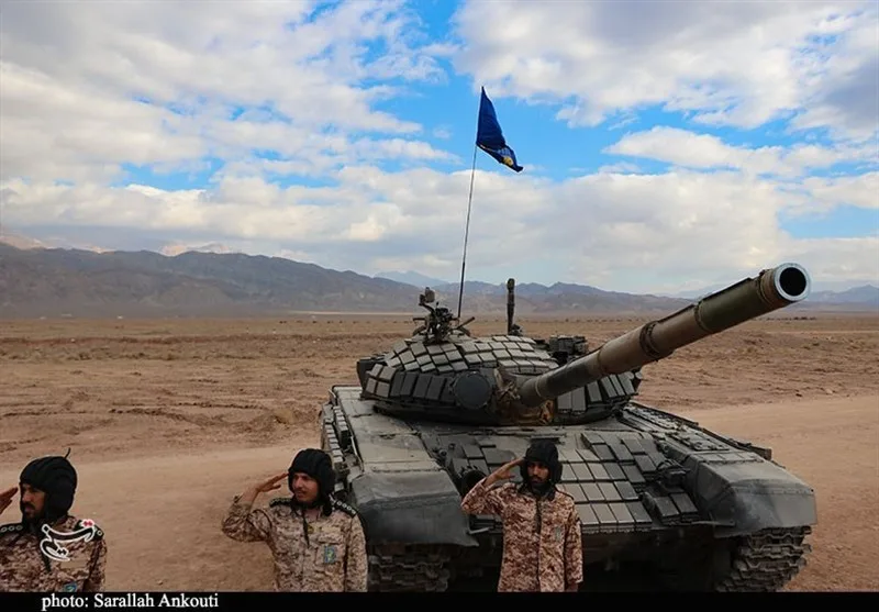IRGC ground forces during a military tactical exercise with soldiers and equipment.