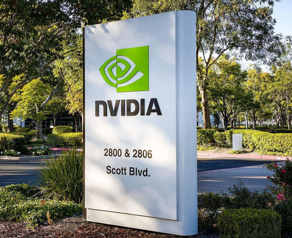 An outdoor NVIDIA logo sign in front of the company's office campus.