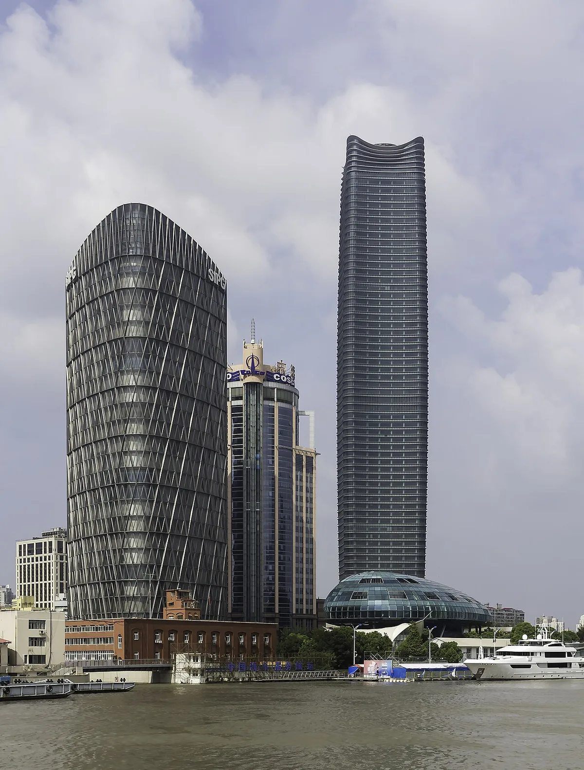 Waterfront high-rise buildings in Shanghai including the International Port Building and Ocean Plaza.