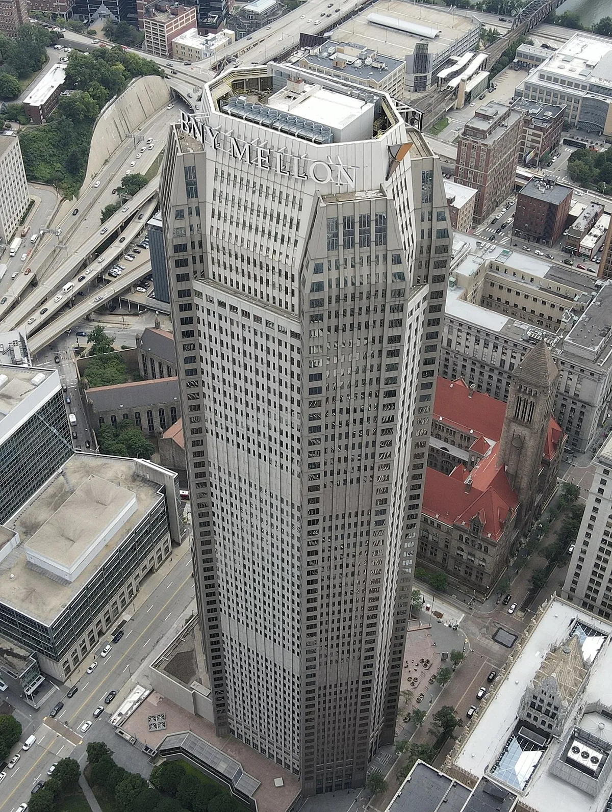 Aerial view of a tall skyscraper in a city downtown, the BNY Mellon Center in Pittsburgh.