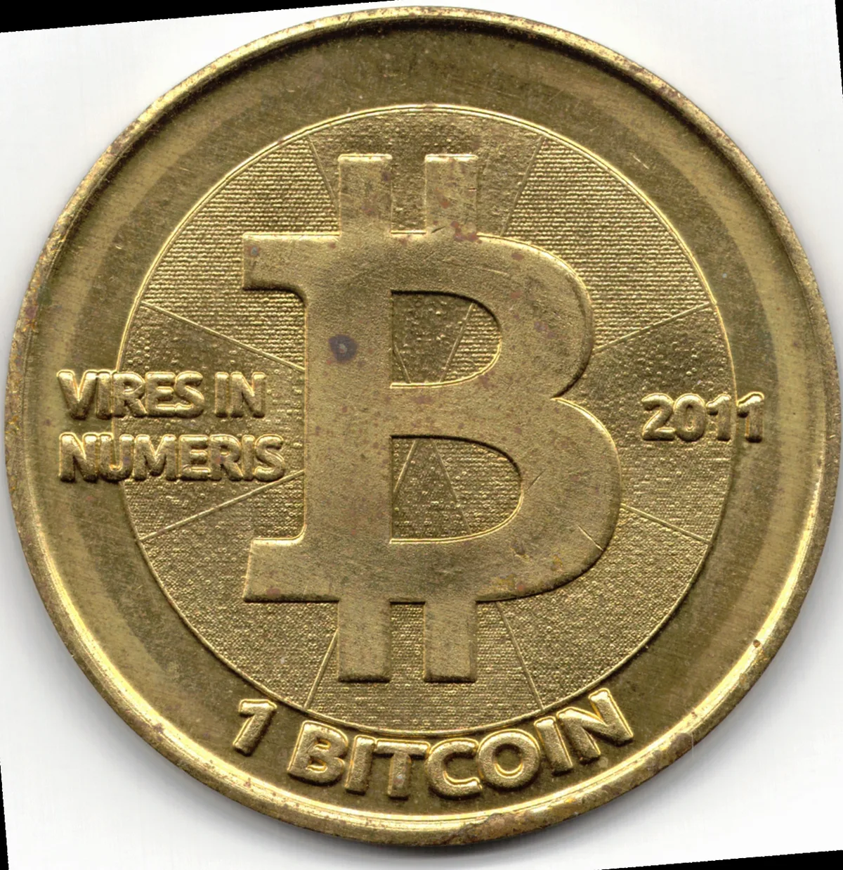 Front of a gold-colored 2011 Casascius one Bitcoin physical coin.